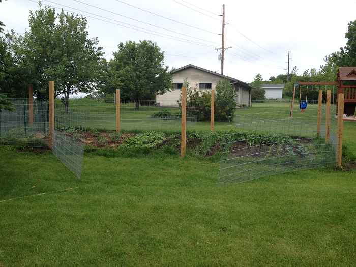 DIY garden fence with a swivel so each panel opens up